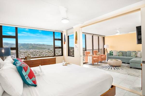 Have a restful night's sleep in your bedroom with a king-size bed and a beautiful mountain view.