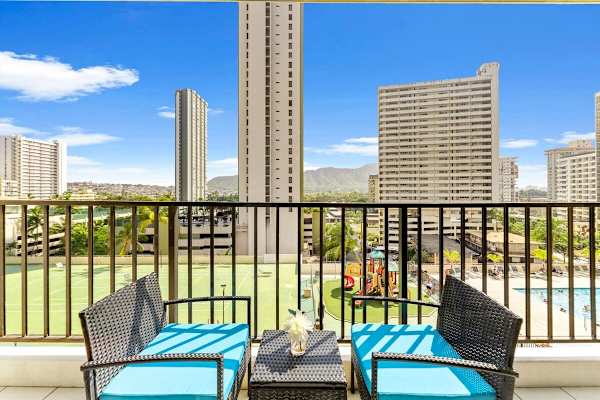 Balcony with patio furniture. Views to Diamond head and the pool area