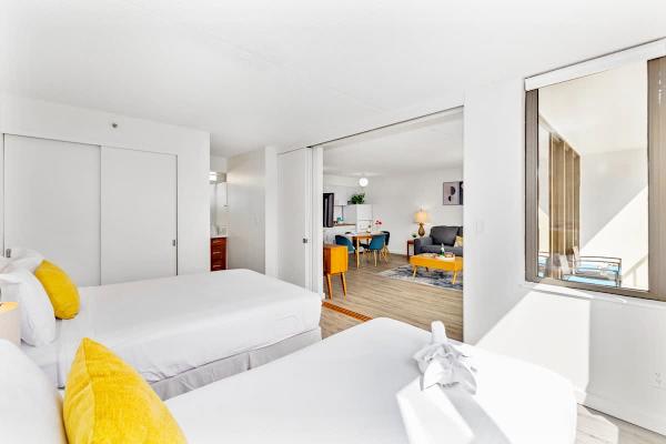 One Queen size- bed and one twin-size bed in the bedroom. Closet and access to the bathroom. Sliding door 