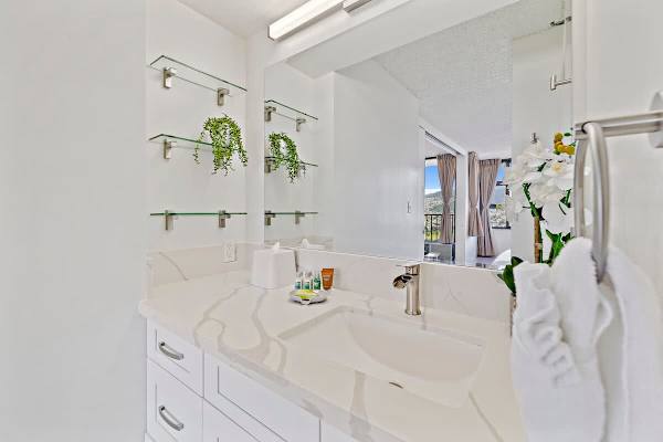 Full bathroom with vanity and cabinet 