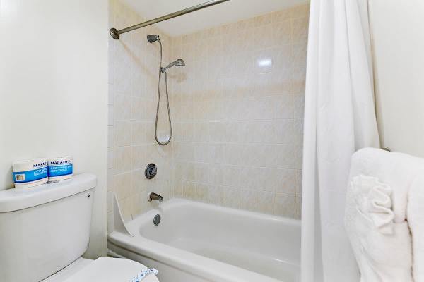 Full Bathroom with tub and shower combo. 