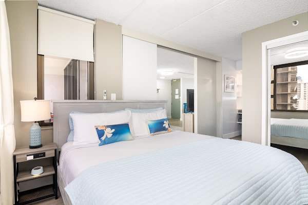 King-sized bed in bedroom