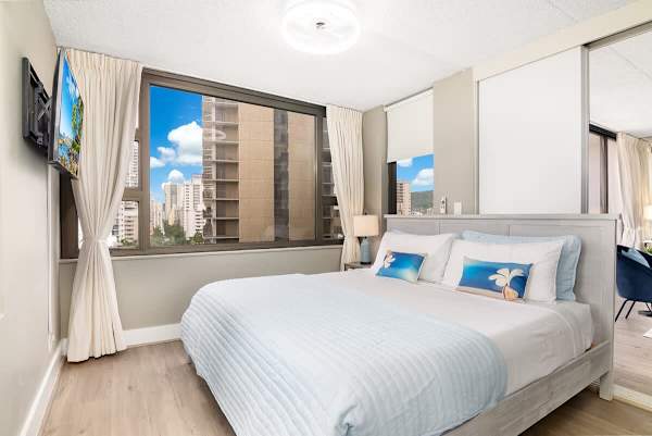 Bedroom with king-sized bed and TV for your entertainment
