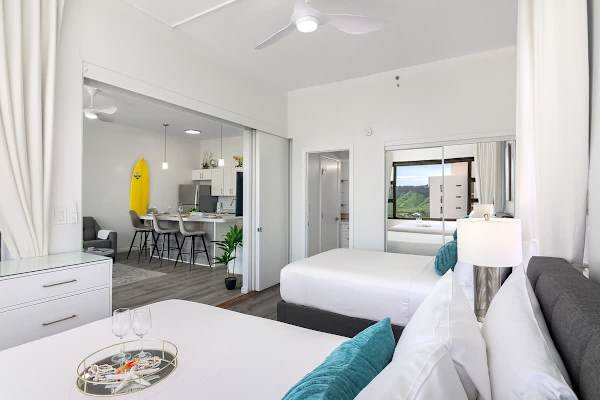 The bedroom is separated from the living room by a sliding door