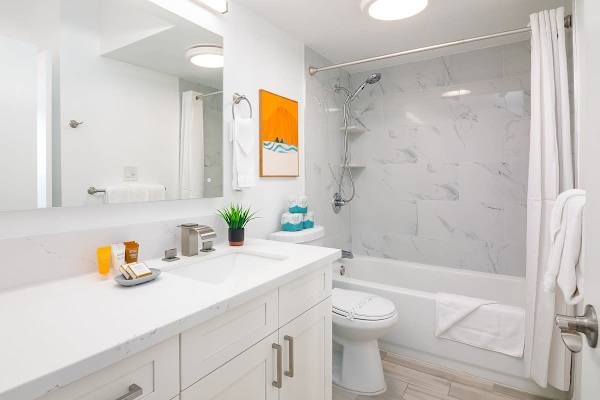 Full bathroom with tub and shower combination
