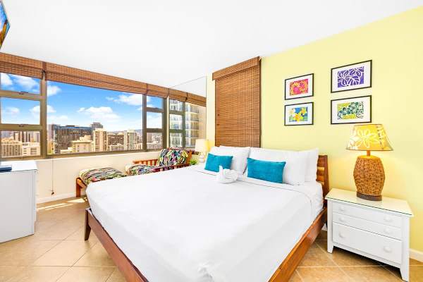 Bedroom with king-size bed and clothing storage