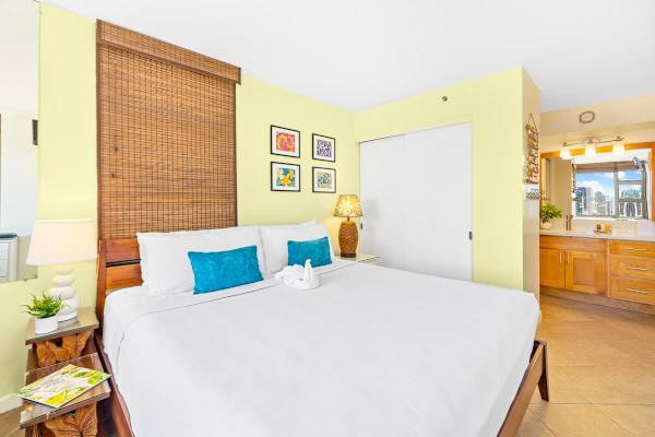 Bedroom with king-size bed and clothing storage