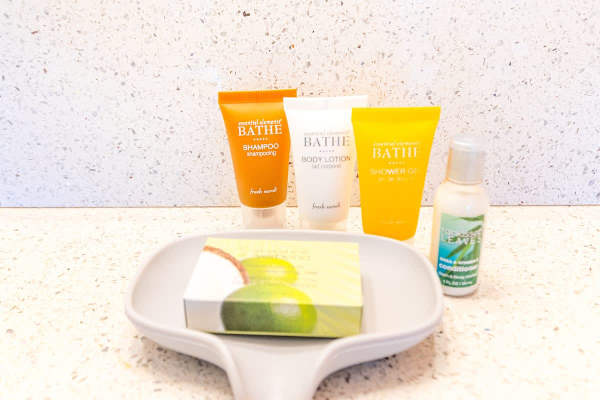 Start-up amenities include soap, shampoo, conditioner, body wash, and lotion