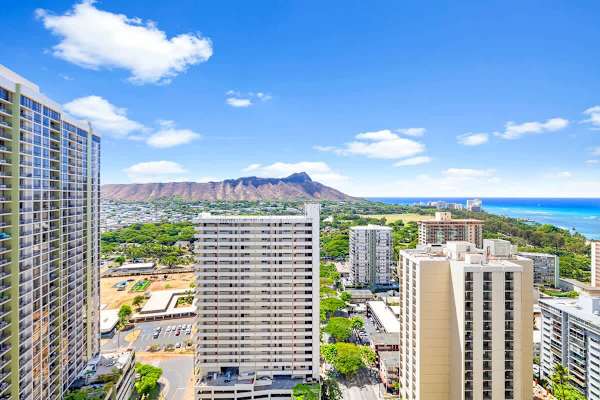 Cityscape view featuring diamond head and the ocean on a clear day