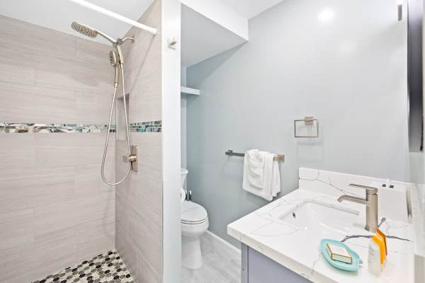The guest bedroom has a full-bathroom with shower!