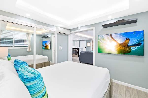 Have a restful sleep in the guest bedroom's cozy queen-size bed!