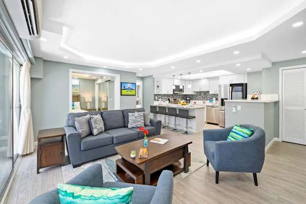 Gather with your family or friends in the living room with a queen-sleeper sofa, 2 chairs and a coffee table!