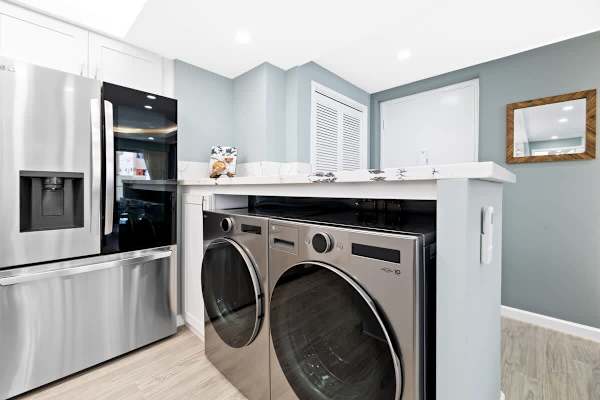 This unit is equipped with a washer and a dryer!