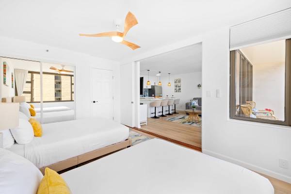 The bedroom is separated from the living room by a sliding door.