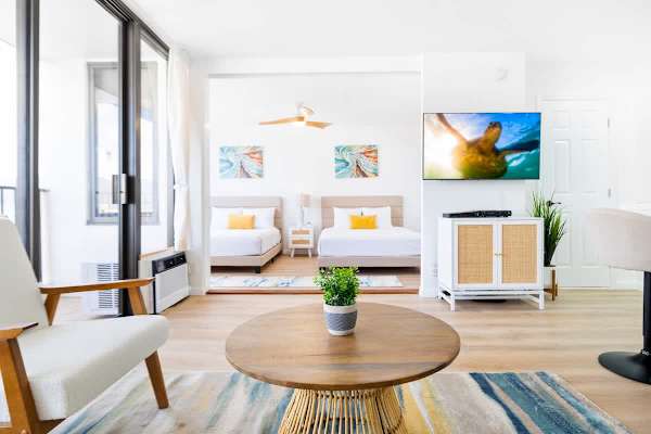 The bedroom is separated from the living room by a sliding door.