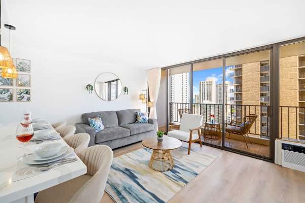 The living area has a pull-out sleeper sofa, 1 chair, coffee table, and window AC