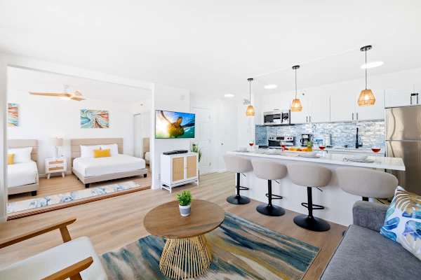 The bedroom is separated from the living room by a sliding door.