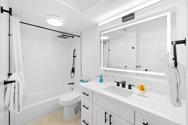 Full bathroom with tub and shower combination