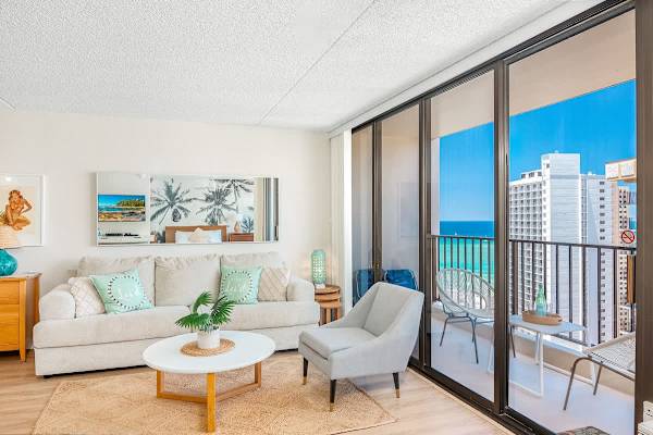 Your living room features a pull-out sleeper sofa, a coffee table, and a comfortable armchair.