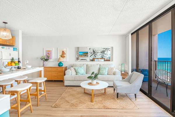 Your living room features a pull-out sleeper sofa, a coffee table, and a comfortable armchair.