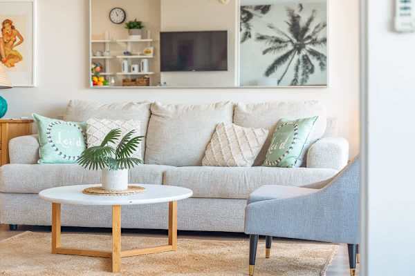 Your living room features a pull-out sleeper sofa, a coffee table, and a comfortable armchair.