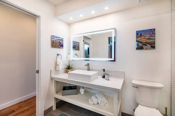 Bathroom with walk-in shower.