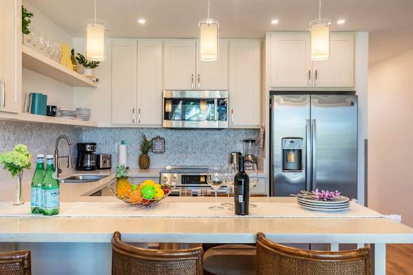 Countertop with 4 bar stools.
