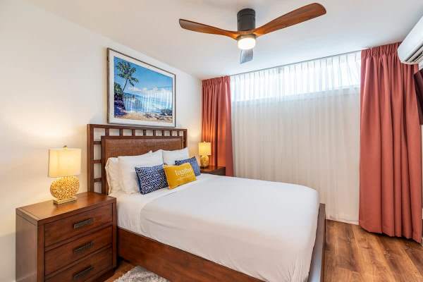 Bedroom 2 with ceiling fan and split AC, and 2 nightstands.