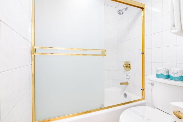 Full bathroom with tub and shower combo