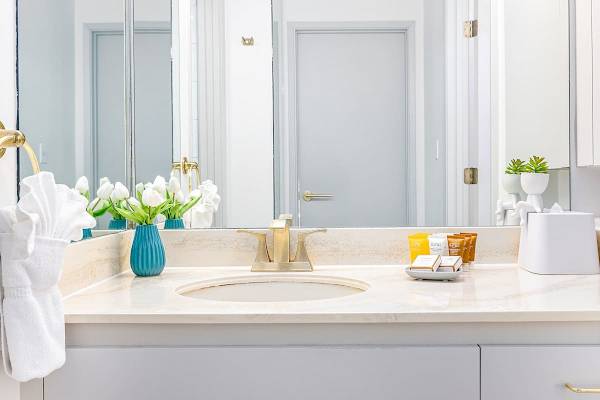 Full bathroom with vanity and a cabinet