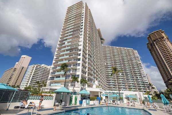 Dive into luxury at the Ilikai Hotel’s sun-soaked pool deck, rising high above the heart of Waikiki for the ultimate island lifestyle.