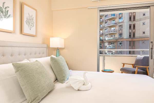 Master bedroom with king-size bed.