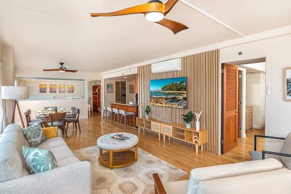 A very spacious living area with a Samsung smart TV.