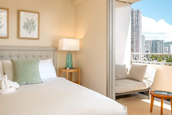 Master bedroom with nightstand.
