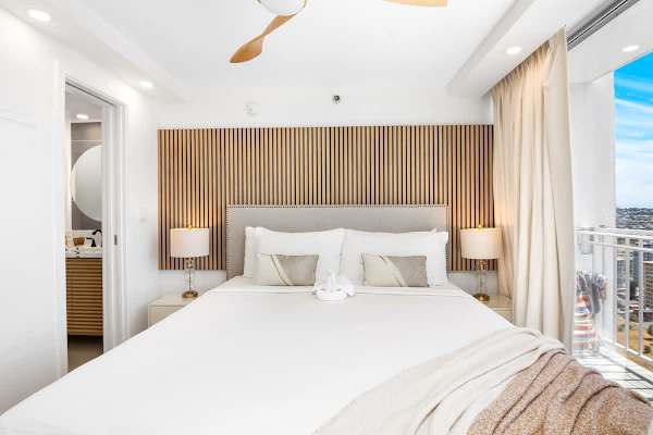 Relax in your condo with a king-size bed and 2 nightstands.