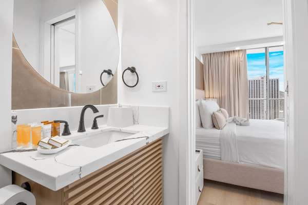 Full bathroom with vanity and cabinet.