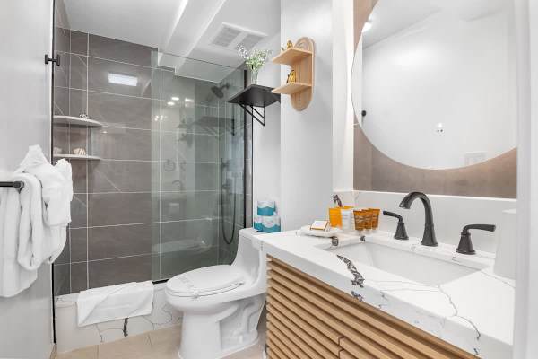 Refresh in your full bathroom with a walk-in shower.