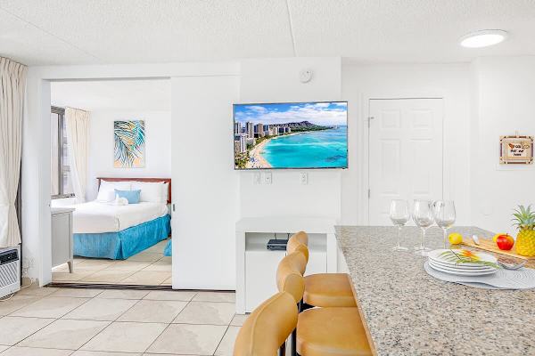 Enjoy shared meals in your dining area with a flat-screen TV.