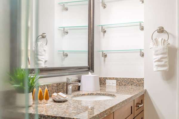 Full bathroom with vanity and cabinet.