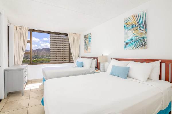 Have a restful sleep in your bedroom with 1 queen and 1 full bed, and a beautiful, stunning diamond head view.