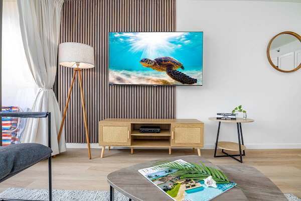 Create the ultimate escape for relaxation and entertainment with our 65" smart TV.