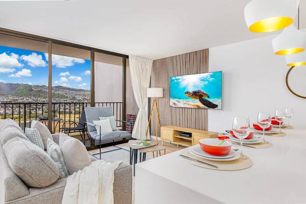 Enjoy an immersive entertainment experience on a 65" smart TV while taking in breathtaking panoramic views from your living area.