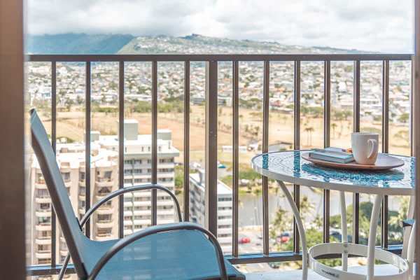 From your balcony, enjoy the panoramic mountain and city views while drinking your cup of coffee.