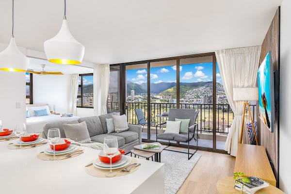 Soak in spectacular mountain and city views from the comfort of your living room, complete with an inviting private balcony.