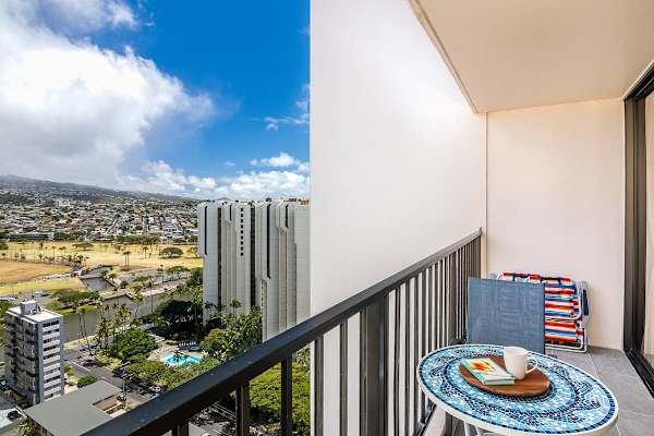 From your balcony, enjoy the panoramic mountain and city views while drinking your cup of coffee.