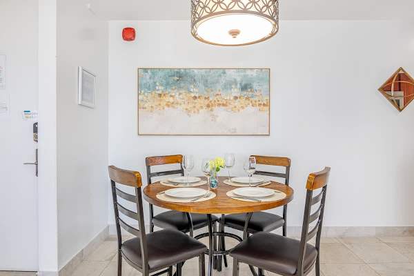 Table and chairs for shared meals.