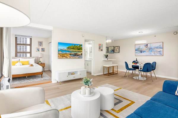 Relax in your living area with a pull-out sleeper sofa, a 55'' Samsung Smart TV, a coffee table, and an armchair.