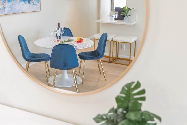 Dining table with 4 chairs for shared meals.