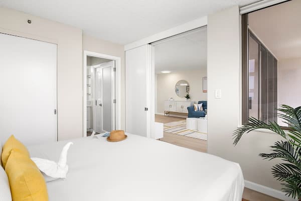 Relax in your bedroom with a king-size bed, a closet, access to the bathroom, and a sliding door that separates from the living room.