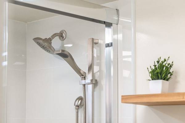 Bathroom with handheld shower.